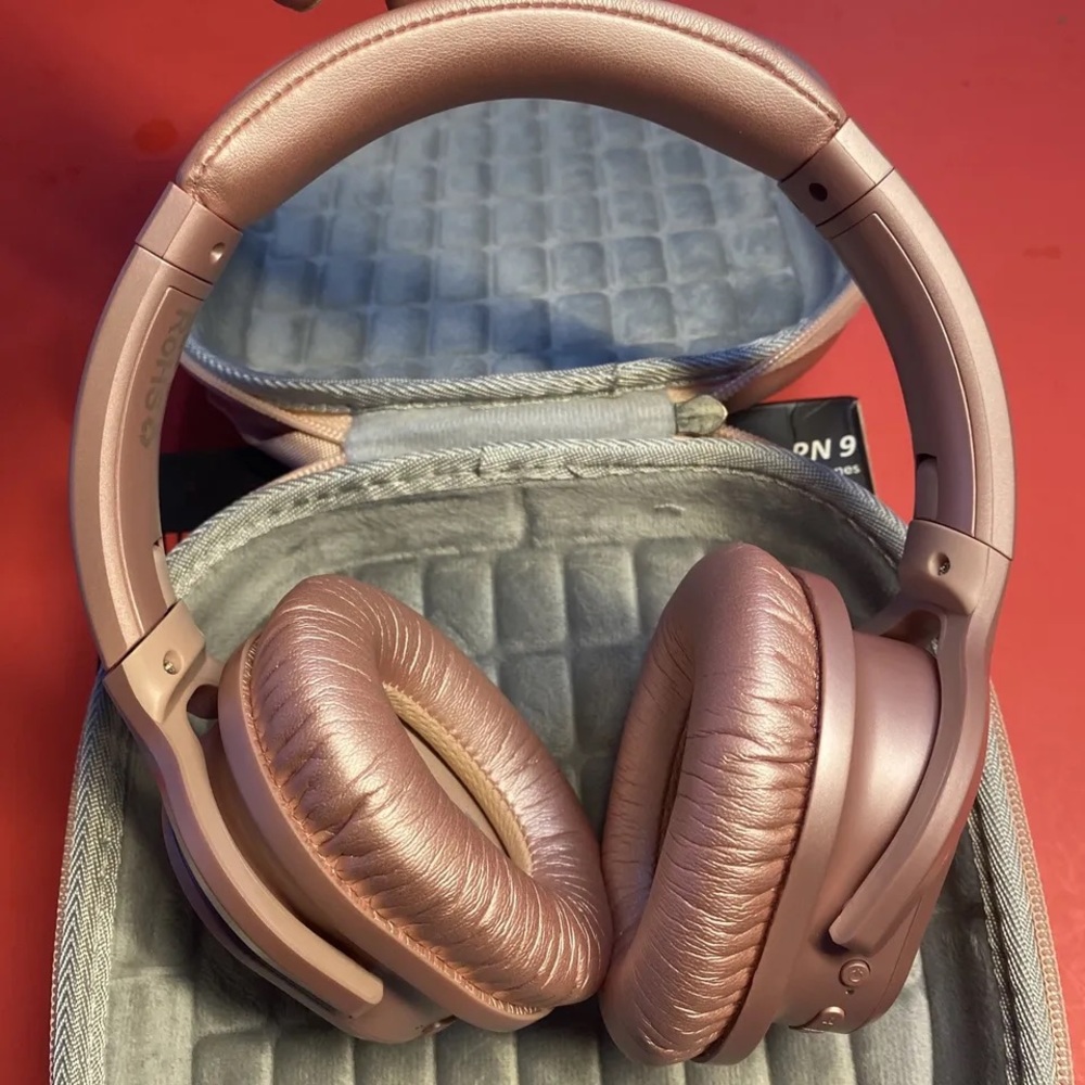 Champagne pink noise canceling headphones with case